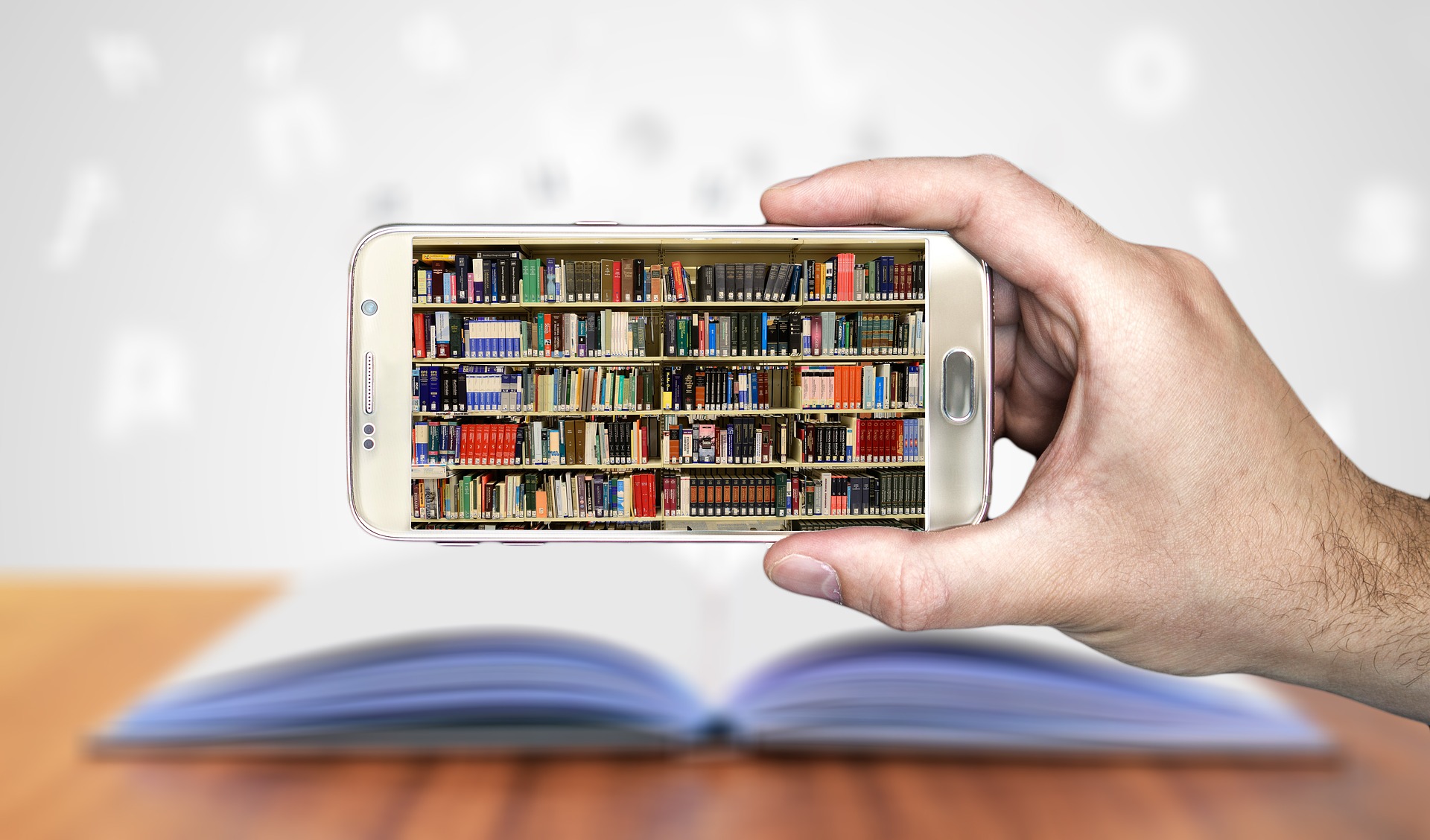 smartphone with picture of books on shelves